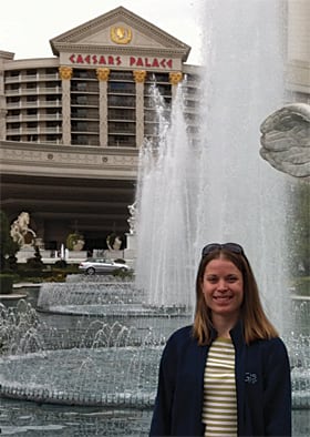 Kitty Hurley all-hazards assessment coordinator poses with her GIS apparel