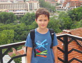 Mariyana Kostov, GIS manager a photo of her son wearing his Esri T-shirt in the city of Veliko Tarnovo in Bulgaria