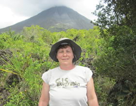 Peggy Staske, an engineering information technician posed in her Esri T-shirt at the Arenal Volcano in La Fortuna Peggy Staske, an engineering information technician posed in her Esri T-shirt at the Arenal Volcano in La Fortuna