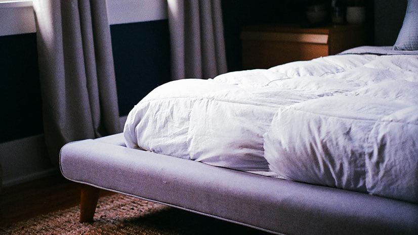 A bed and mattress similar to those manufactured by Corsicana Mattress