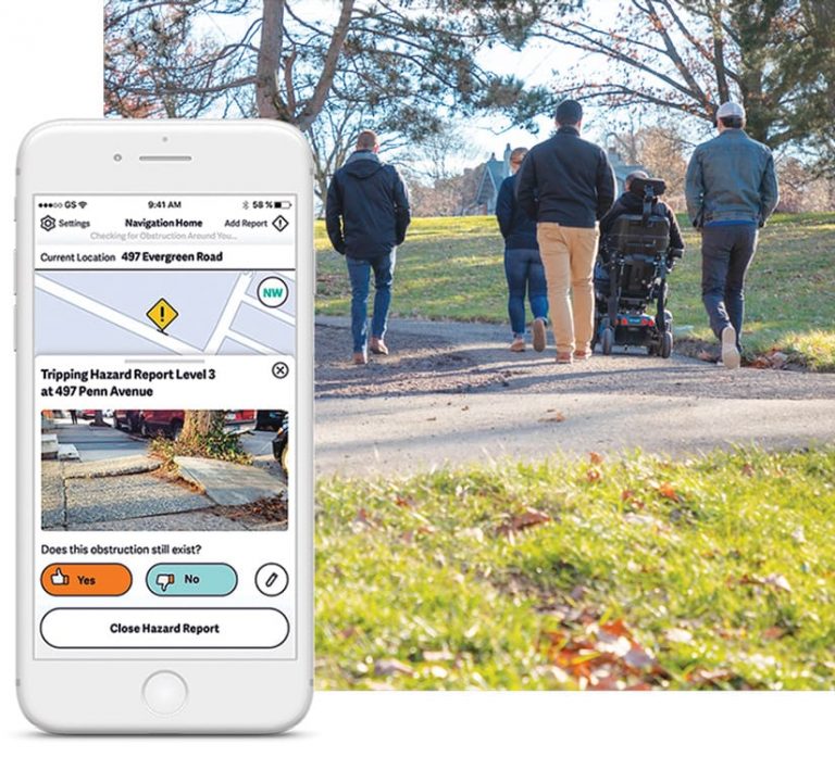 A phone screen with a map showing a sidewalk hazard and a photo of four people walking and one person in a wheelchair