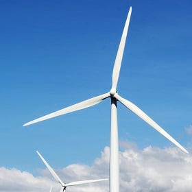 A wind turbine creates renewable energy A wind turbine creates renewable energy