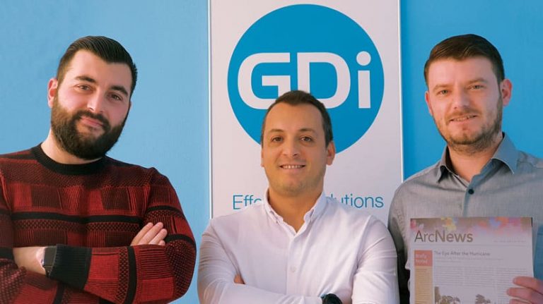 A photo of the three-person GDi team