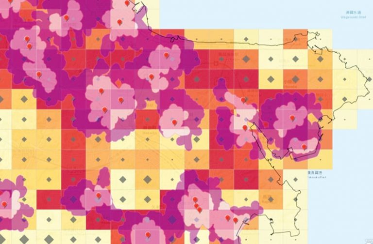 A screenshot of a map from Fujitsu with pink, purple, red, and yellow overlays