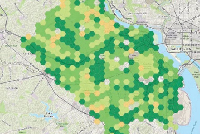 A map of Arlington County with dark green, light green, and yellow dots all over it