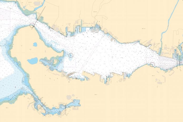 A standard-looking tan, blue, and white chart showing the coastline of Vancouver Harbour, Canada A standard-looking tan, blue, and white chart showing the coastline of Vancouver Harbour, Canada