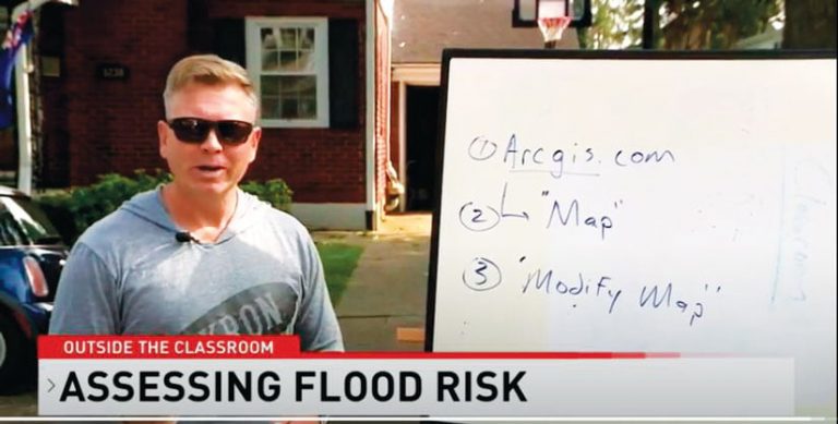 Ryan Miller on TV standing next to a white board that says, “1. Arcgis.com, 2. Map, 3. Modify Map.” The lower-third on the screen says, “Outside the Classroom: Assessing Flood Risk”