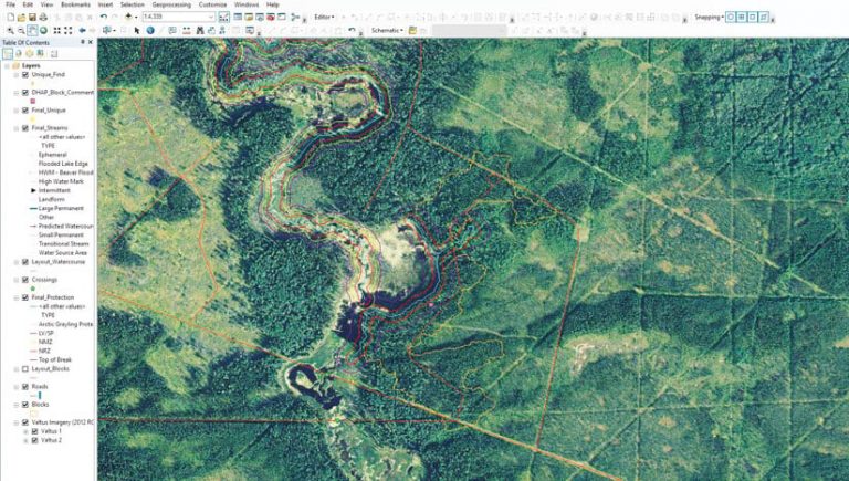 A completed map showing permanent buffers in red indicating a watercourse and roads where timber cannot be harvested A completed map showing permanent buffers in red indicating a watercourse and roads where timber cannot be harvested