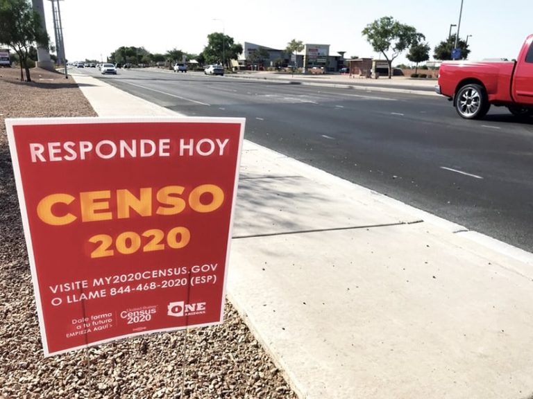 Census sign in Spanish advertising on a street and sidewalk in Phoenix, Arizona