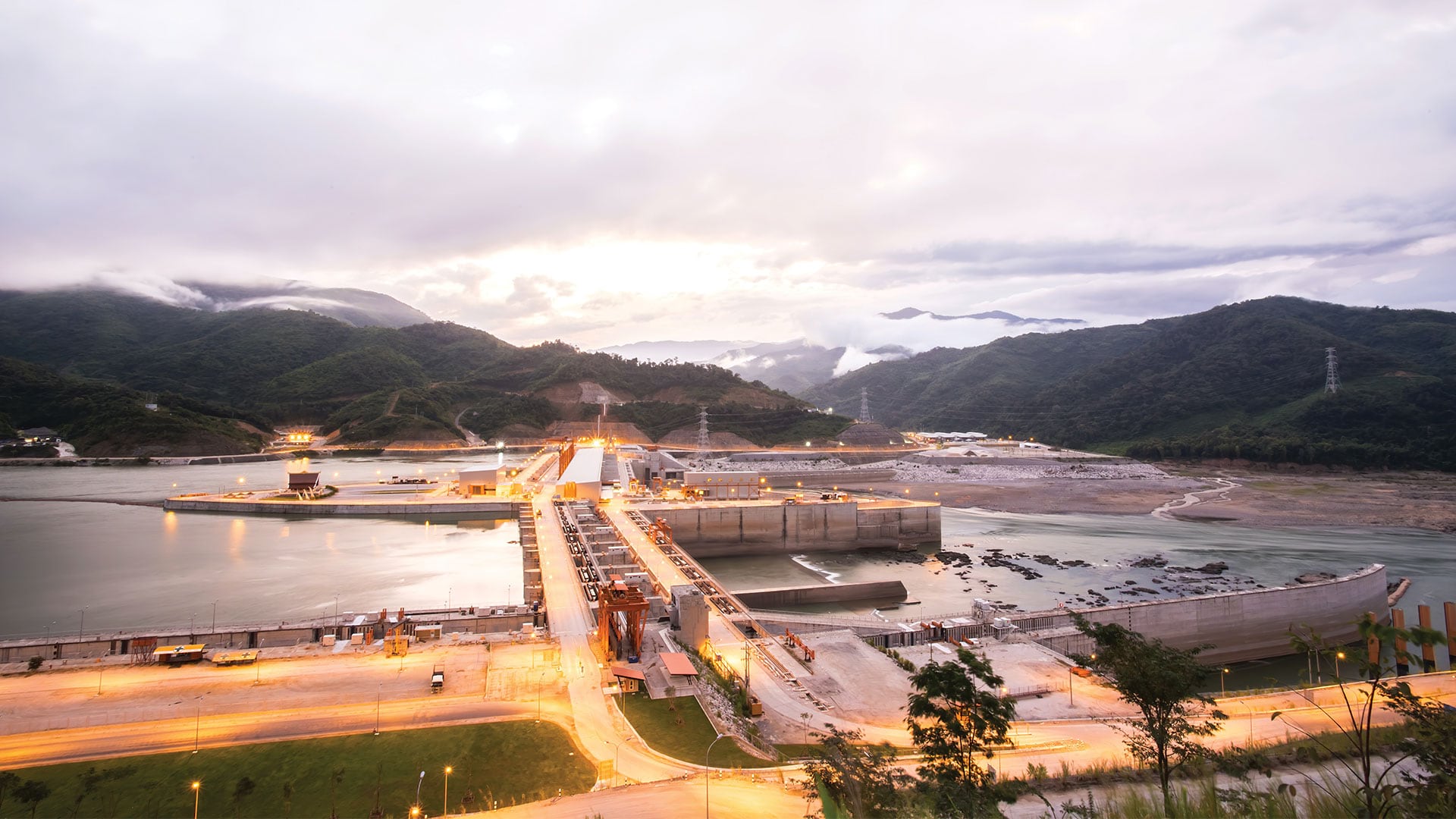 The Xayaburi Dam lit up before night fall