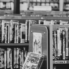 A closeup shot of video rentals representing a Family Video store A closeup shot of video rentals representing a Family Video store