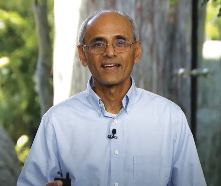 Sud Menon smiling while talking Sud Menon smiling while talking