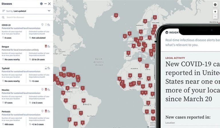 A tablet and a smartphone showing disease outbreaks around the world A tablet and a smartphone showing disease outbreaks around the world