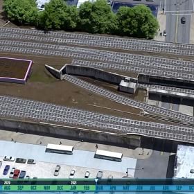 A 5D digital twin shows railroad tracks and project budget and cost