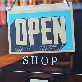 An open sign represents retail resurgence