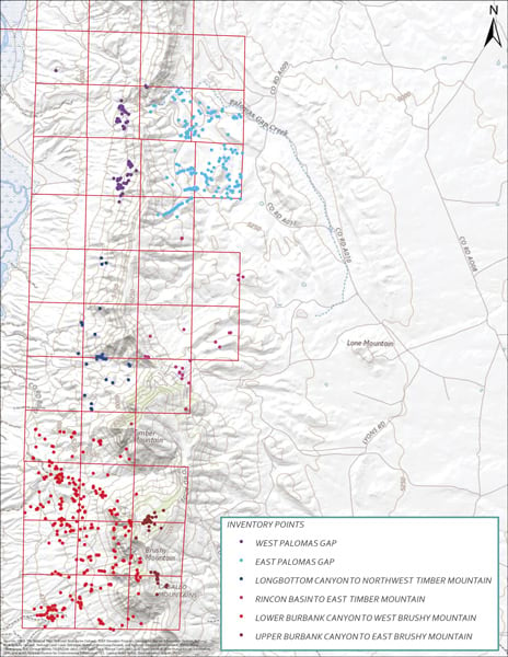 Points of various colors scattered on a map with red squares that create a grid around the points