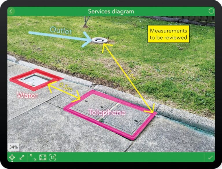 A photo of utility assets on and near a sidewalk that’s annotated with colorful lines, labels, and measurements