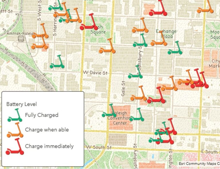 A street map with scooters in red, orange, and green in various places, plus a legend that says that red scooters need to be charged immediately, orange scooters need to be charged when able, and green scooters are fully charged