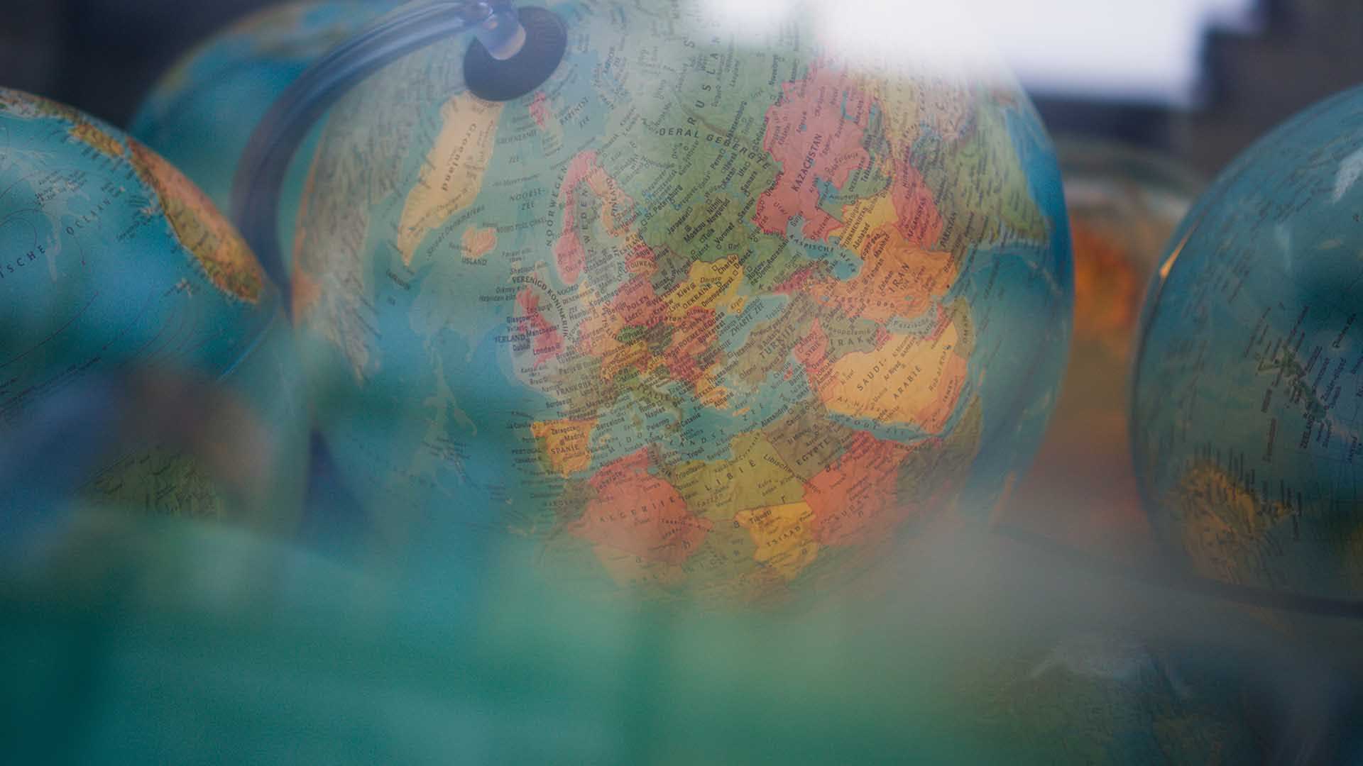 A desktop globe signifies the importance of a geographic approach to business expansion