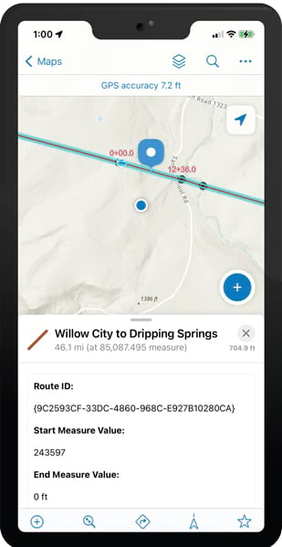 A line on a map showing the distance between Willow City and Dripping Springs with a blue dot in the middle indicating where the user is relative to a point of interest