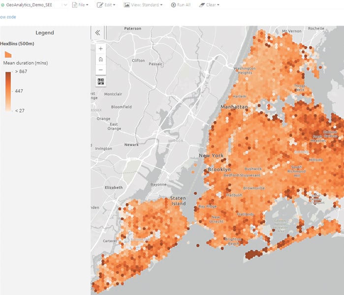 A map of the five boroughs of New York showing hexagonal dots in various shades of orange