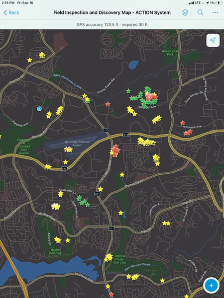 A dark map of Carlsbad with yellow, green, and red stars in various places A dark map of Carlsbad with yellow, green, and red stars in various places
