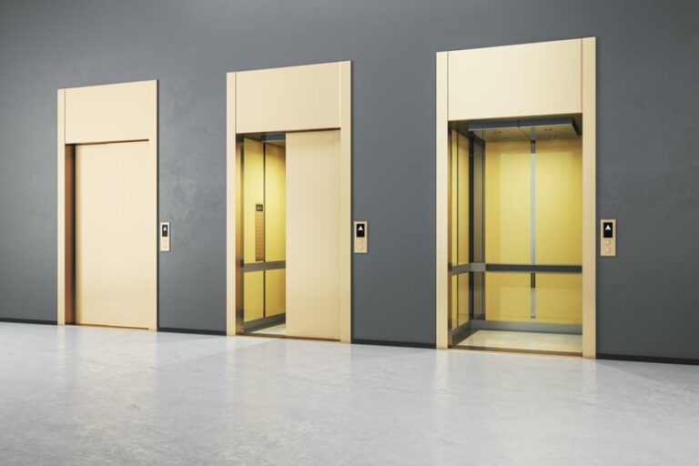 Three elevator doors, with one open, one half-open, and one closed