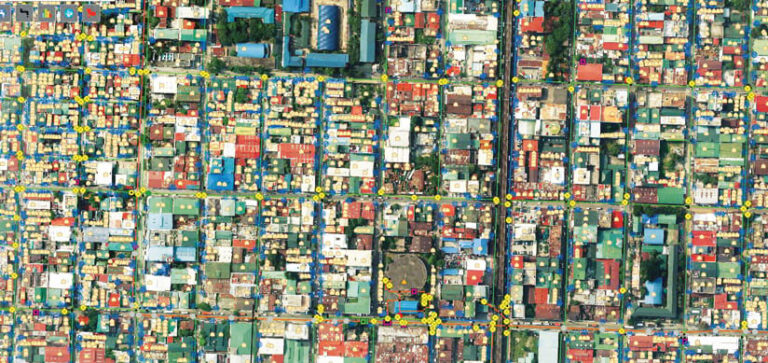 Aerial imagery of a residential area with yellow and blue dots on it
