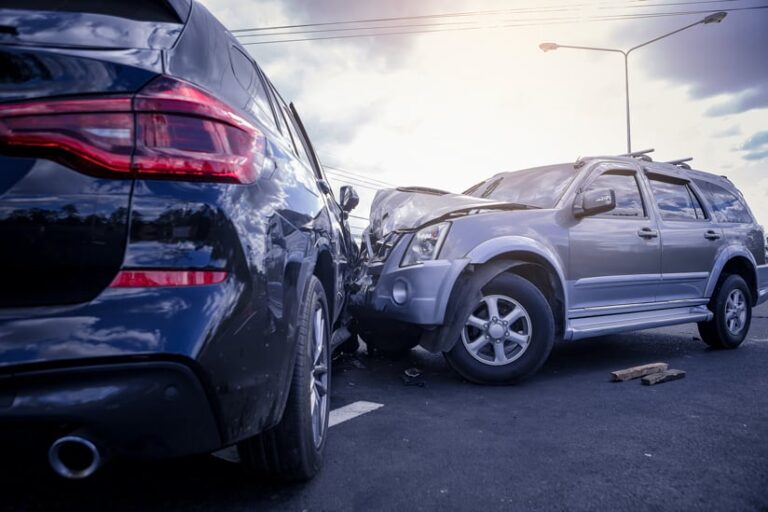 Two cars that have crashed into each other Two cars that have crashed into each other