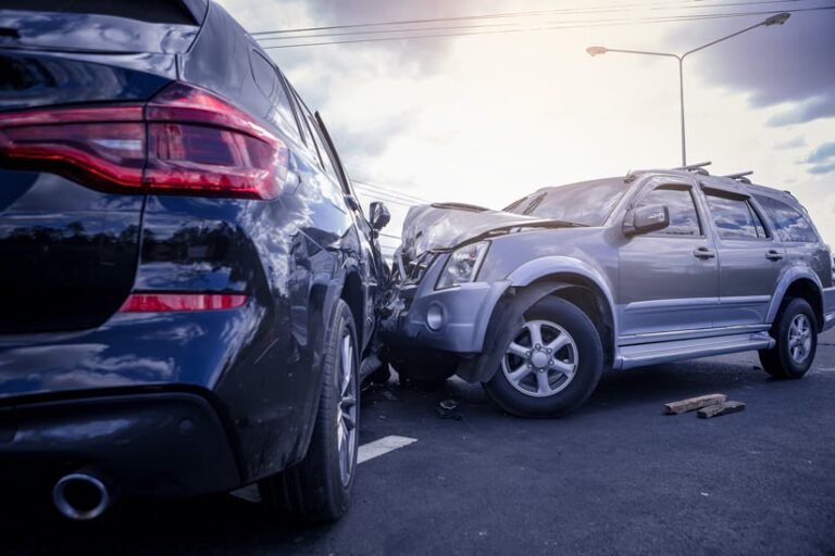 Two cars that have crashed into each other