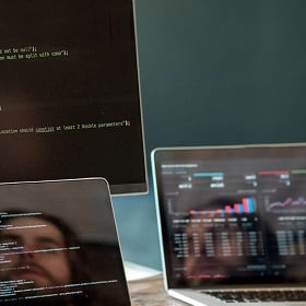 Computer screens with code Computer screens with code