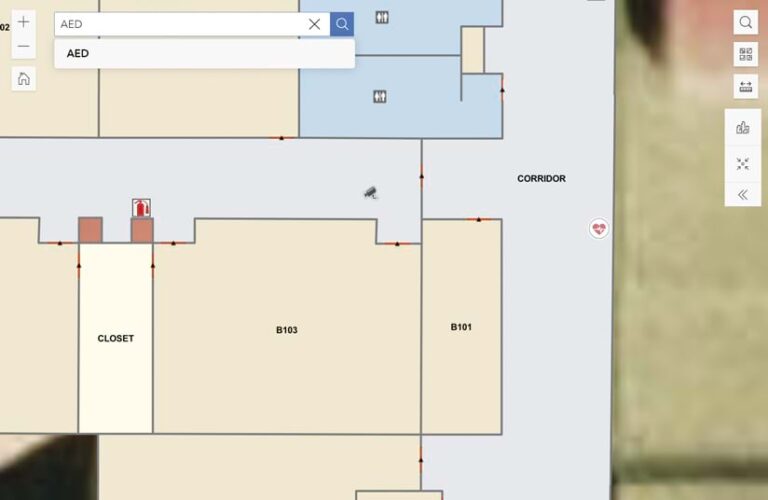 A detailed indoor map of a school that shows classrooms, bathrooms, and closets along with the locations of things like fire extinguishers and security cameras