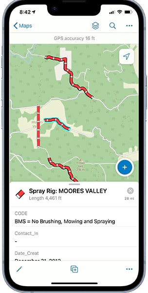 A mobile phone app shows a map with a mostly green background and four narrow red areas that are labeled “Spray Rig: Moores Valley.”