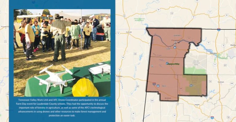 A map of northwestern Alabama shows four sections of the state, all shaded brown. To the left of the map is a photo showing a group of schoolchildren watching an outdoor AFC demonstration.