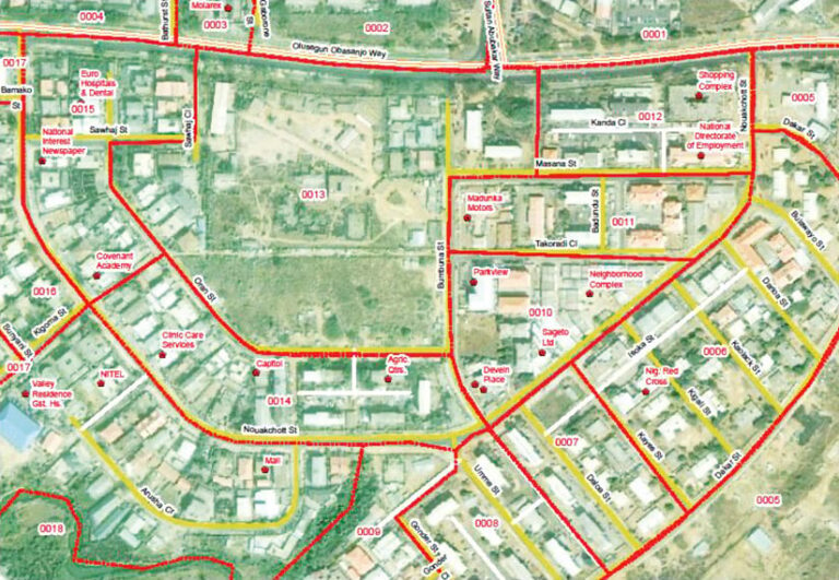 A mostly green and tan map shows several groups of buildings and surrounding areas, each outlined in red.