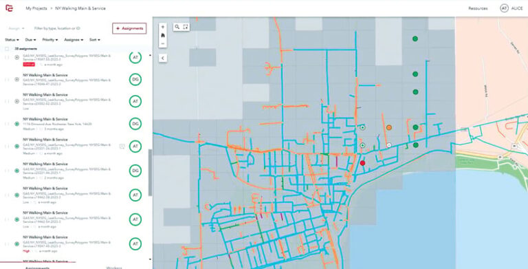 A screenshot of a work management software dashboard. The dashboard displays a map overlaid with blue lines (presumably pipes) and colored dots (presumably work orders) in different areas. A list of work orders is shown on the left side of the screen, each with its status, priority, and assigned worker. A screenshot of a work management software dashboard. The dashboard displays a map overlaid with blue lines (presumably pipes) and colored dots (presumably work orders) in different areas. A list of work orders is shown on the left side of the screen, each with its status, priority, and assigned worker.