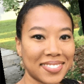 person smiles at camera