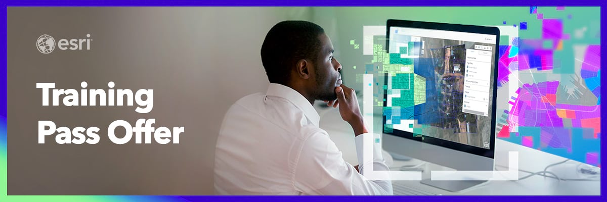 Person takes GIS training on a desktop computer.