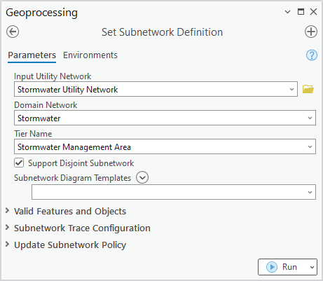 The graphic shows the set subnetwork definition geoprocessing tool. The tool is pointed at the stormwater utility network, stormwater domain network, and stormwater management area tier. It shows that this subnetwork supports disjoint subnetworks. The form has several collapsed sections for Valid Features and Objects, Subnetwork Trace Configuration, and the Update Subnetwork Policy.