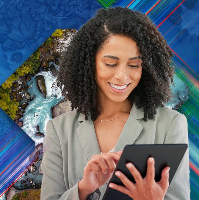 Woman looking at her tablet and touching the screen.