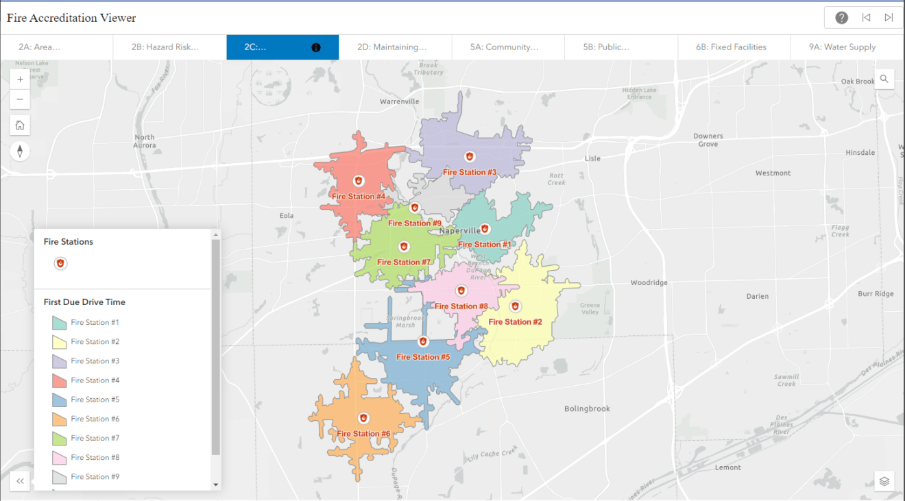 Map with different colored polygons and points representing fire station locations.