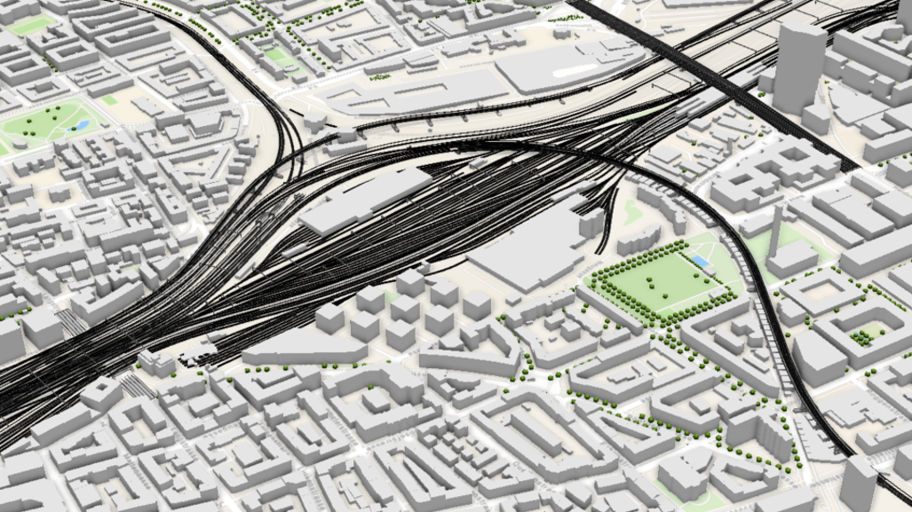 A 3D model with CAD, BIM, and GIS data illustrating a complex arrangement of railway track network in an urban setting.