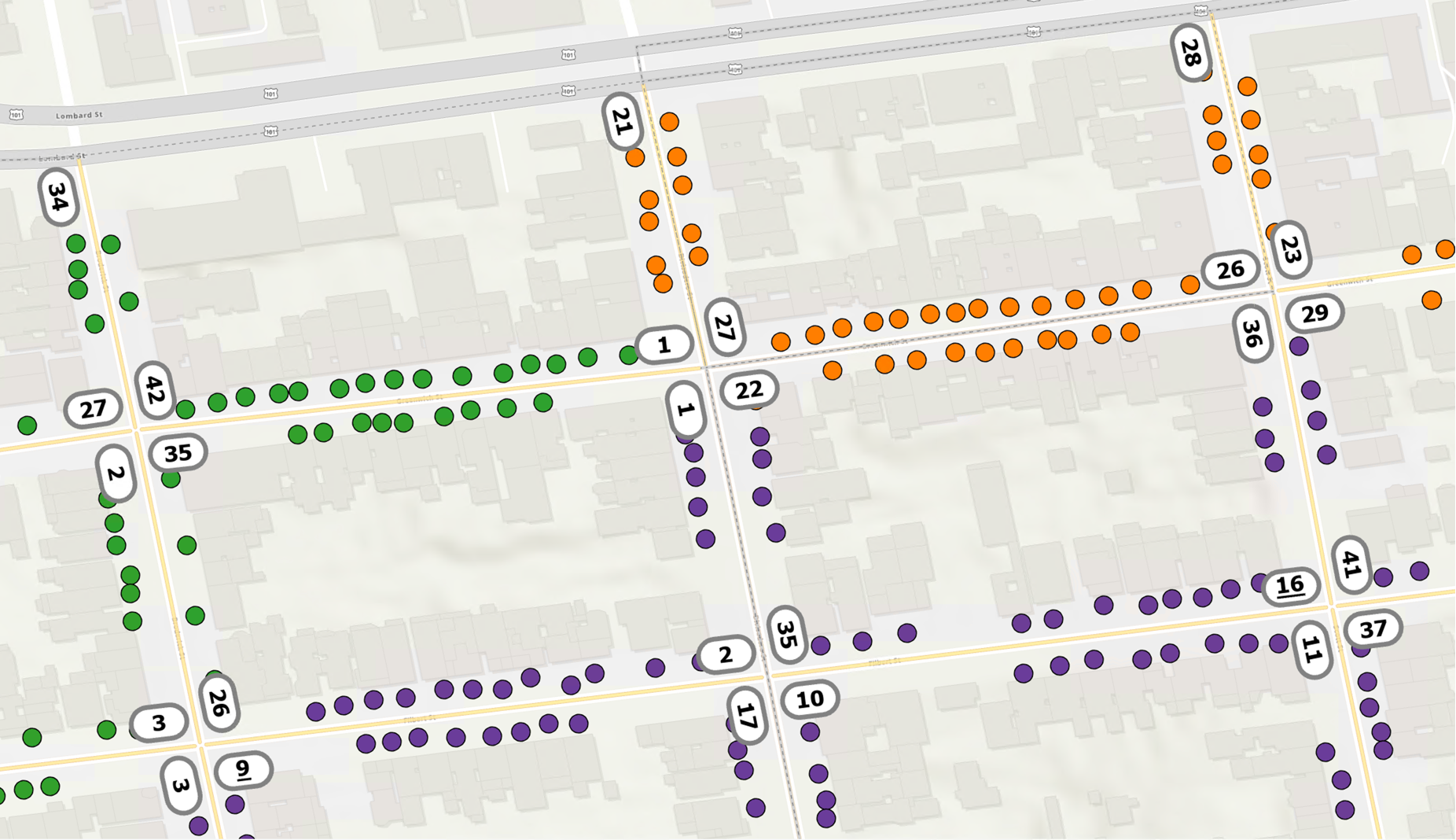 Colored dots on a gray street map represent balanced drive routes.