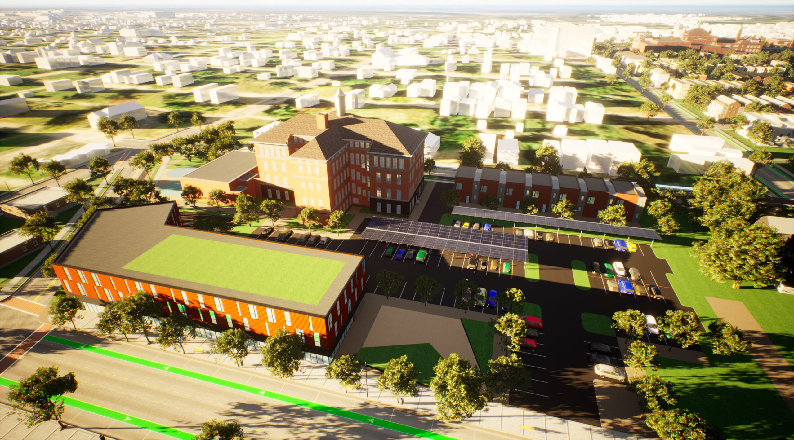 Aerial view of the Marshall School mixed-use development, featuring a renovated school building, new residential units, and solar-powered parking. Located on Dr. Martin Luther King Jr. Dr.
