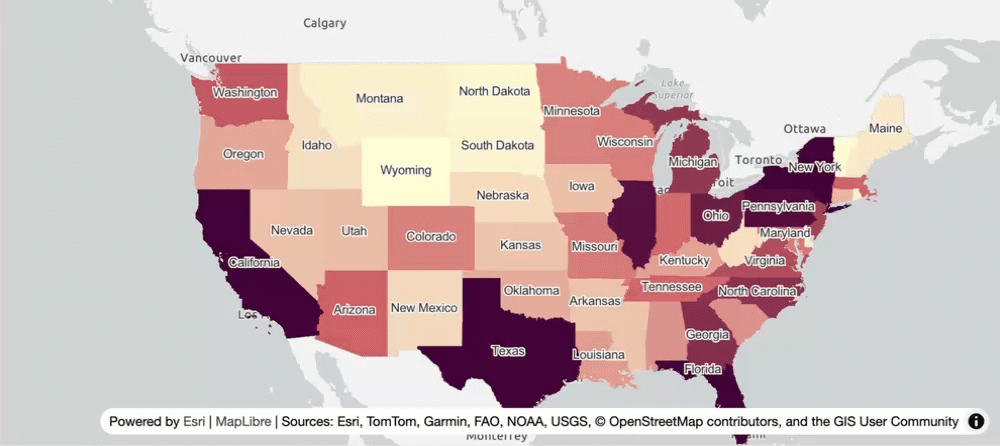A map with a styled vector tile layer of U.S. states that shows population counts in popups