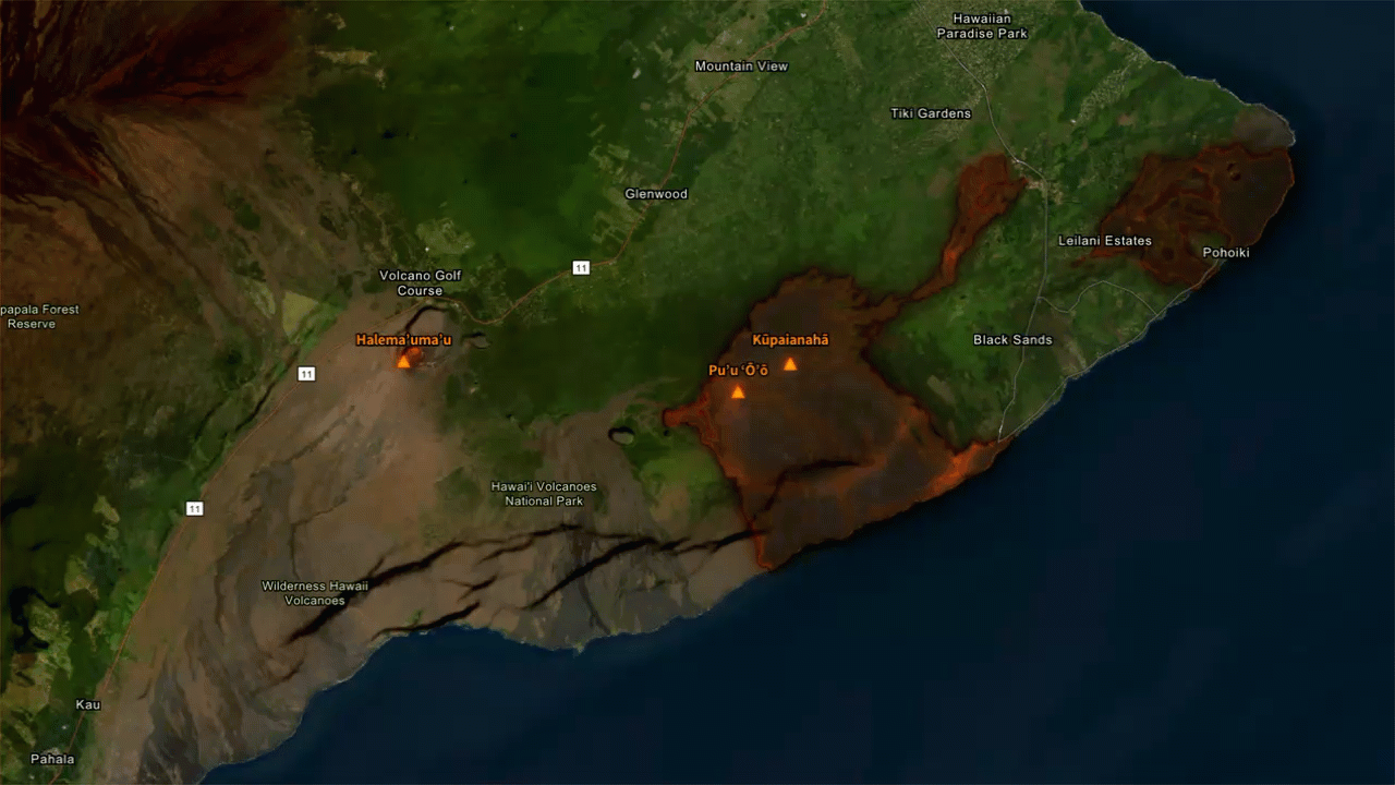 An aerial imagery basemap showing the southern coast of the island of Hawaii. The map is focused on the summit of Kīlaeua with vents Pu’u ‘Ō’ō and Kūpaiʻanahā also shown on the map. Surrounding these two vents is the extent of the lava flow from the 2018 eruption. Within this extent, a series of glowing orange rings radiate outwards from the vent to convey "heat waves" within the lava flow.