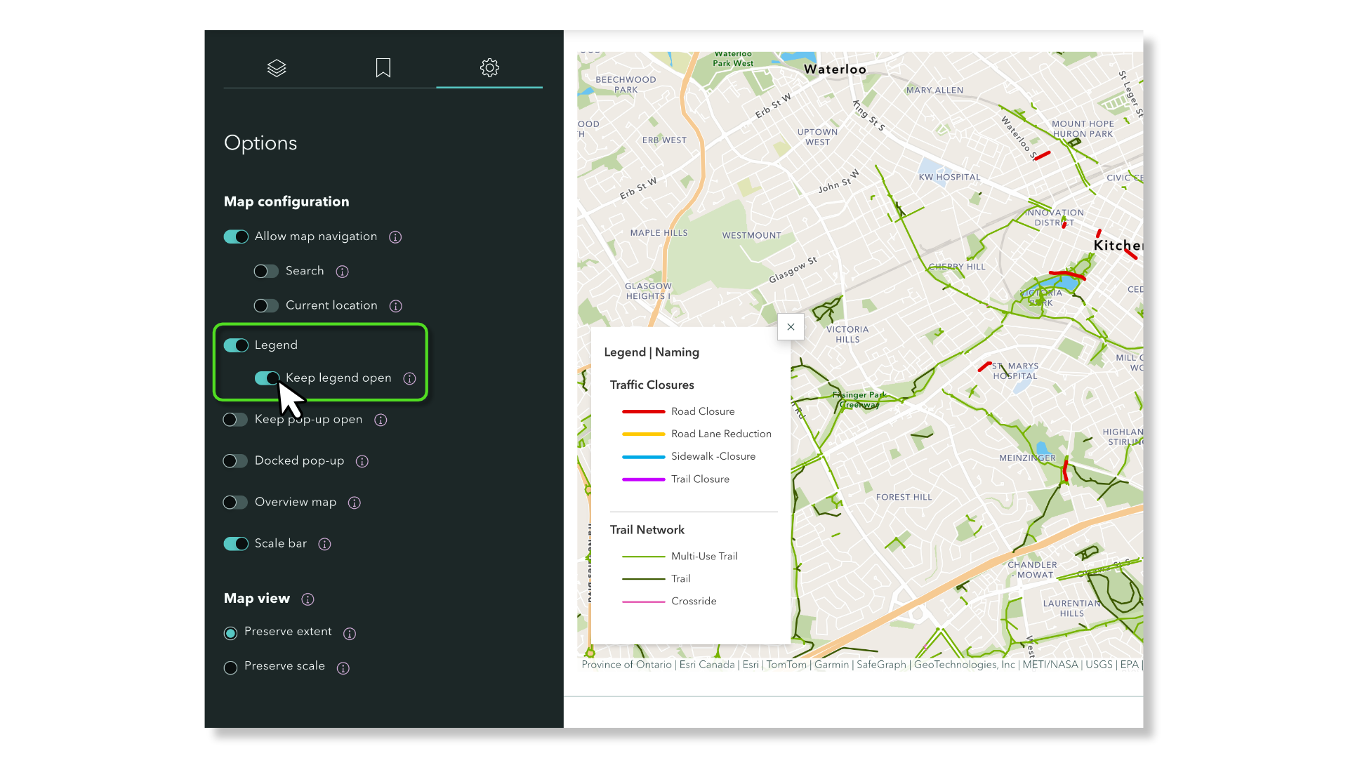 A screenshot of the ArcGIS StoryMaps map configuration interface, split into two panels. The left panel shows a dark-themed "Options" sidebar with a "Map configuration" section containing several toggle switches. The "Legend" toggle is switched on (teal/blue), and its nested sub-option "Keep legend open" is also toggled on. Both the "Legend" and "Keep legend open" toggles are highlighted with a bright green rectangle, and a cursor arrow points to the "Keep legend open" toggle. The right panel shows a street map of the Waterloo and Kitchener area in Ontario, Canada, with colored line features overlaid representing traffic closures and trail networks. A floating legend panel titled "Legend | Naming" is open on the map, displaying two grouped sections: "Traffic Closures" with four colored line symbols (red for Road Closure, yellow for Road Lane Reduction, cyan for Sidewalk Closure, and magenta for Trail Closure) and "Trail Network" with three symbols (lime green for Multi-Use Trail, dark green for Trail, and pink for Crossride).