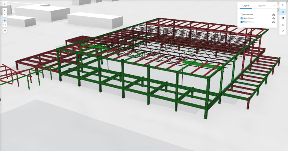 View of a building framework showing green and red colored structures.