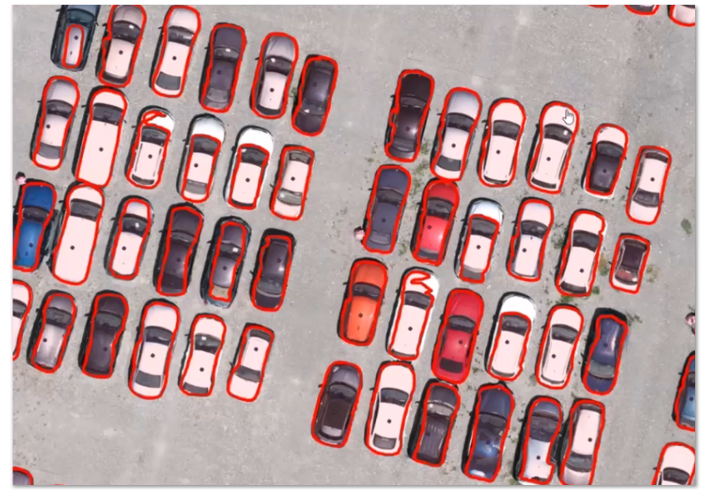 Automatically converting a point feature class into accurate instance segmentation boundaries around vehicles.