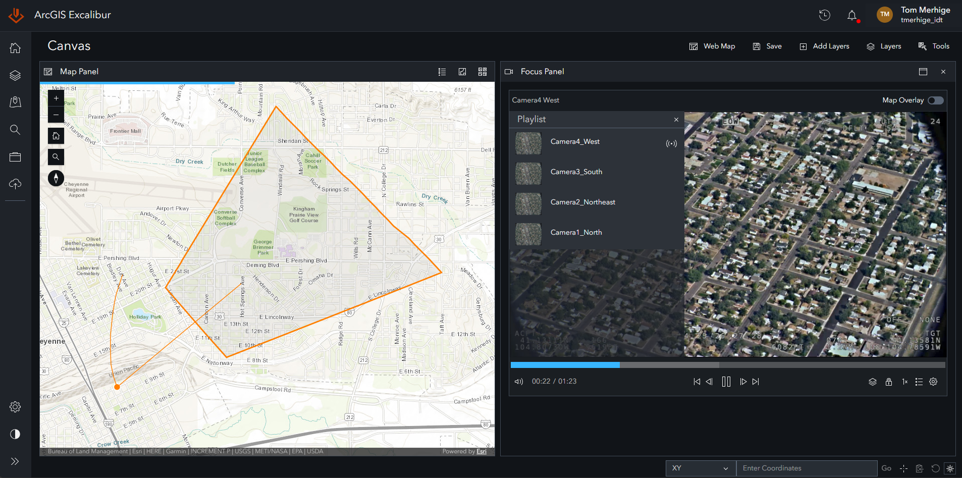 ArcGIS Excalibur interface showing a map with multiple camera locations connected to a video service and a video panel displaying live footage from one of the feeds.
